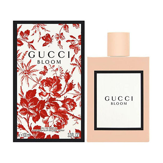 Gucci Bloom perfume bottle and packaging with floral design